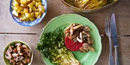 Bietenburger met paddenstoelen, aardappels en andijvie uit de oven