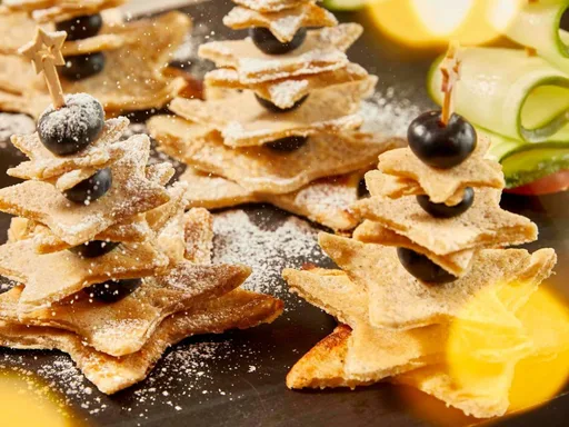 Besneeuwde pannenkoekboompjes